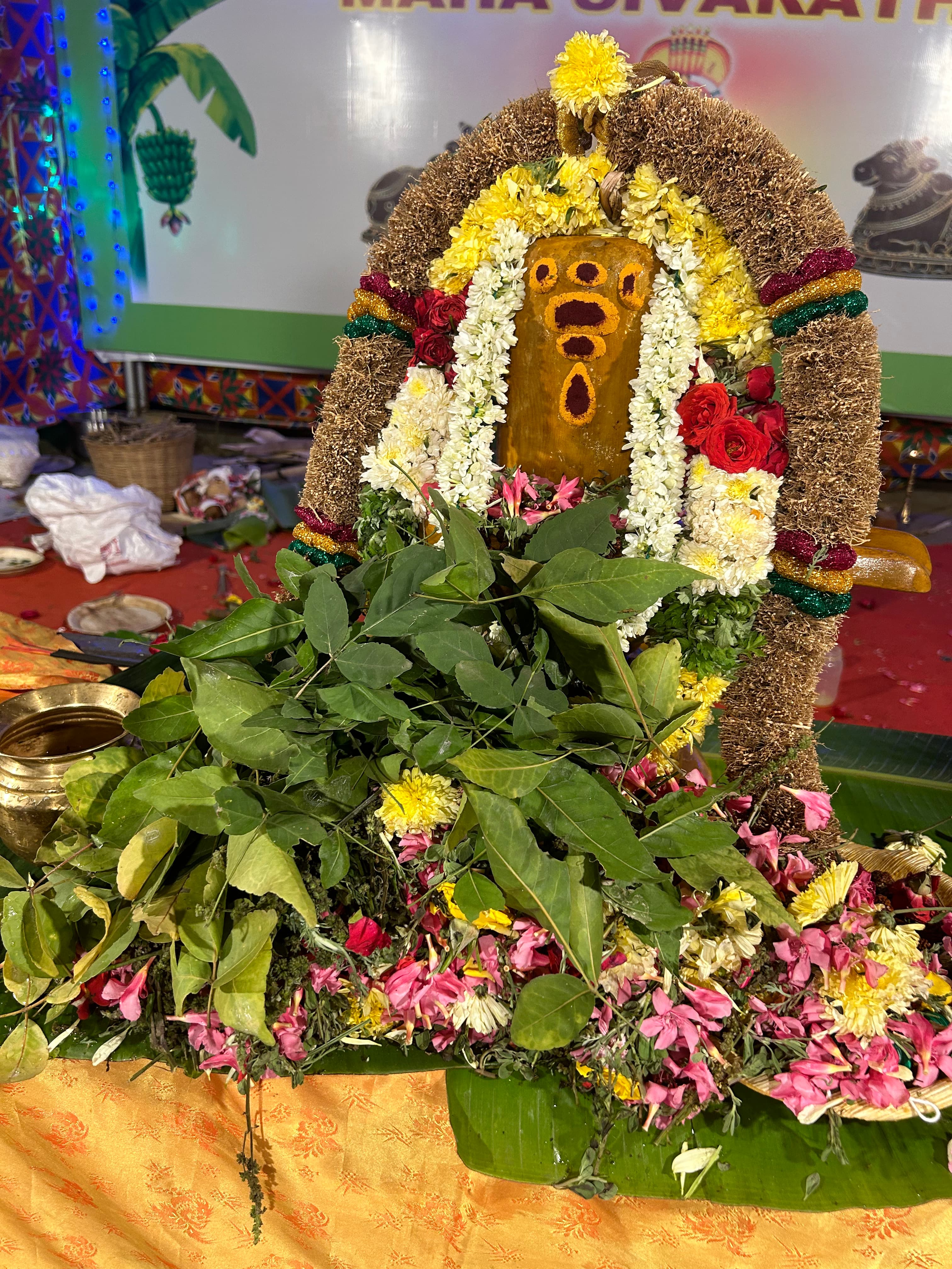 Traditional brass lamps illuminating ceremony